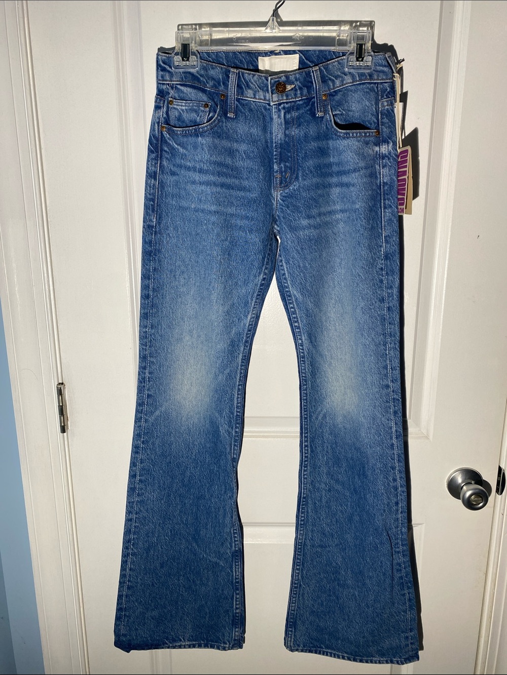 MOTHER Flare Jeans in Washed Blue Denim